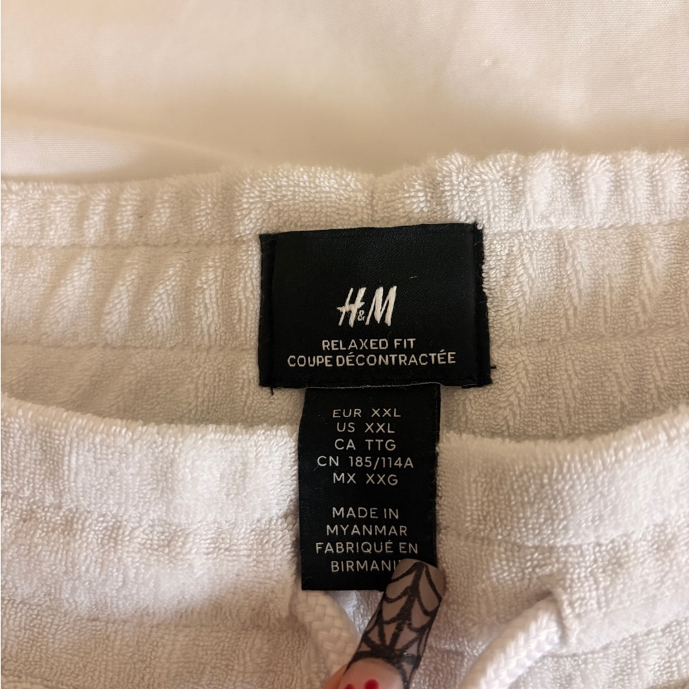 H&M men’s white terry cloth shorts with pockets